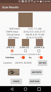 Example of the Soil Color Scanner interface that shows all possible color system values for a soil sample, and options for "Field mode, Dry soil, GPS location, and attaching a photo of the soil color sample