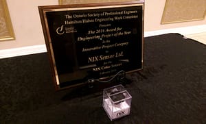 A plaque from the Ontario Society of Professional Engineers presents the 2016 Award for the Engineering Project of the Year to Nix Sensor Ltd.