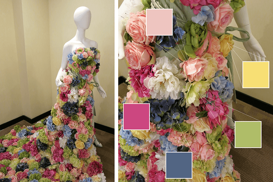 A dress made out of silk flowers featured a rainbow of colors like blue, pink, yellow, and green