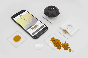 Nix QC Color Sensor in use measuring powders