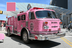 A pink firetruck shows support for breast cancer awareness