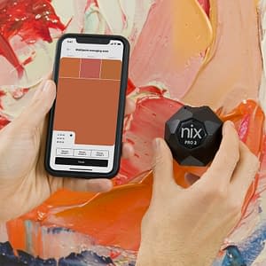 Nix Pro Color Sensor scanning red abstract painting